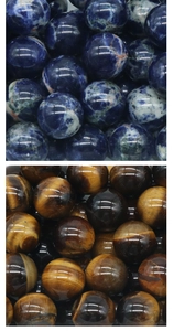 Detail of 25mm blue sodalite and tiger eye stones for chakra yoga meditation