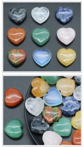 Detailed macro view of assorted heart-shaped polished healing crystals and gemstones