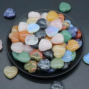 Polished natural crystal heart-shaped stones in various colors for home decoration