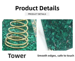 Macro shot of gold spiral wire and smooth polished base edge of malachite pyramid