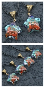 Macro shot of resin pentagram pendant featuring natural chakra crystals and copper coil