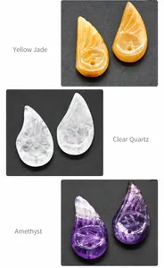 Detailed comparison of hand-carved wing pendants in yellow jade, clear quartz, and amethyst
