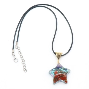 Star-shaped resin pendant necklace with natural crystal chips and copper spiral wire