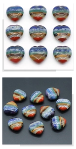 Polished heart-shaped seven chakra healing stones with colorful layered natural agate