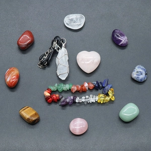 Chakra healing crystal kit with rose quartz heart, stone bracelet, and quartz pendant