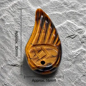 Approx. 30mm natural tiger eye wing pendant with golden brown cat eye effect texture