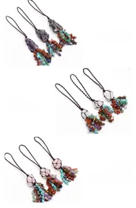 Detail of natural crystal stone car hanging with hand-woven rope and colorful tassels