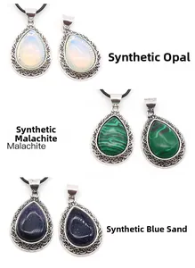 Detail of teardrop opal, malachite, and blue sand stone pendants with retro silver frames