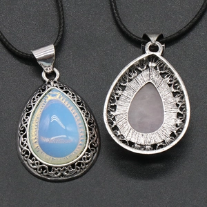 Natural teardrop crystal pendant necklace showing front gemstone and hollow metal back
