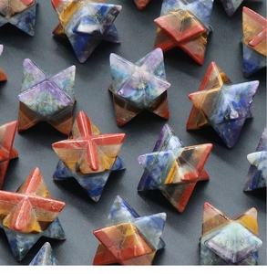 Macro view of multi-layered natural crystal Merkaba stars with vibrant stone stripes