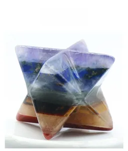 Detailed view of handmade Seven Chakra Merkaba star crafted from layered natural crystal stones