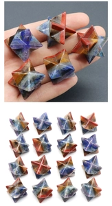 Macro detail of Merkaba Seven Chakra stones showing layered crystal star geometry