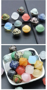 Detailed macro view of assorted natural crystal mini planet and UFO desk ornaments