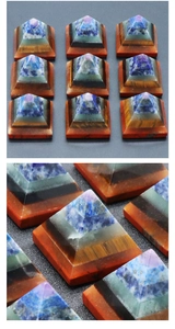 Detailed macro view of 7 chakra natural healing stones layered in a crystal pyramid