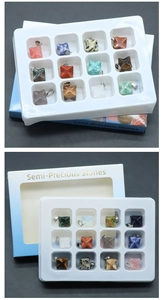 Set of 12 star-shaped semi-precious stone pendants in a gradient blue display box