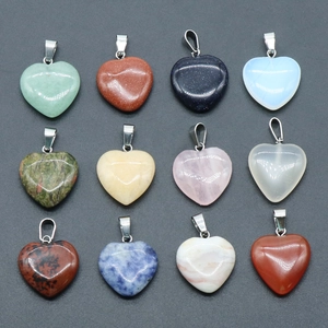 Set of 12 natural heart crystal stone pendants with metal bails in various vibrant colors