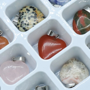 Assorted natural crystal heart pendants in rose quartz and agate with silver bails