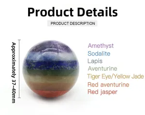 Detail view of 40mm 7 chakra crystal ball with labeled layers from Amethyst to Red Jasper