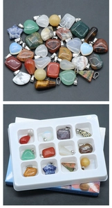 Detailed set of 12 natural semi-precious stone pendants in various shapes and storage box