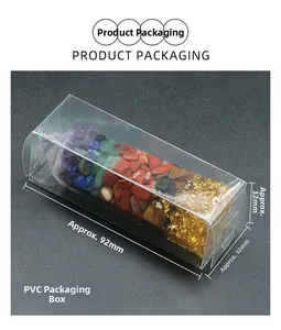 Transparente PVC-Verpackung mit bunten Chakra-Steinen und Details aus Goldfolie