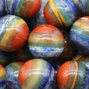 Polished 7 Chakra natural crystal ball layered with various colorful gemstone spheres