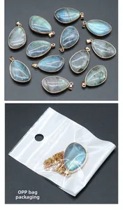 Pendentifs en labradorite en forme de goutte avec bordure dorée et emballage en sac OPP