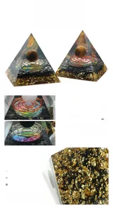 Macro detail of Orgone Pyramid showing Tiger Eye sphere and copper metal spiral wire