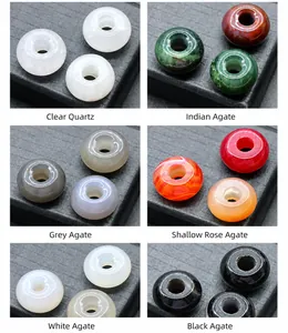 Macro detail of natural agate beads with 6mm large holes in multiple colors for DIY jewelry