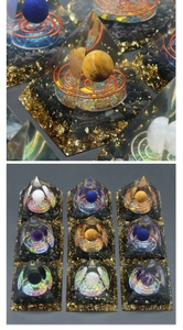Macro detail of orgone pyramid with resin, crystal sphere, copper coil and gold foil