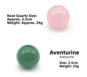 Detailed view of 2.5cm polished natural rose quartz and green aventurine crystal balls