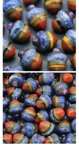 Macro detail of acorn-shaped mini ornaments crafted from layered multi-color natural crystals