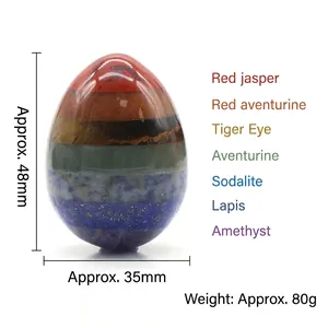 Polished 48mm 7 chakra crystal egg crafted from tiger eye and natural gemstones