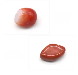 Detailed comparison of natural Red Agate and Red Jasper tumbled stones on white background