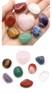 Detailed set of 7 natural polished healing crystals including heart rose quartz and stones