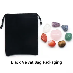 Healing natural crystal set with seven irregular stones and pink heart in black pouch