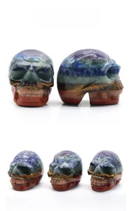 Macro detail of hand-carved seven chakra gemstone skull with distinct crystal layers