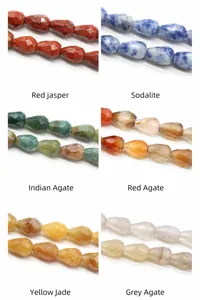 Macro detail of faceted teardrop gemstone beads in red jasper and assorted agates