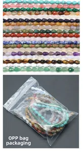 Teardrop faceted crystal quartz beads displayed with clear OPP bag packaging