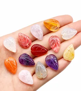 Detailed view of hand-carved natural crystal leaf petals for DIY jewelry making