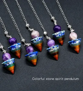 Detailed close-up of cone-shaped natural colorful stone spirit pendulums with silver chains