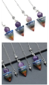 Detailed view of 7 chakra natural stone cone pendant with silver chain and hollow beads