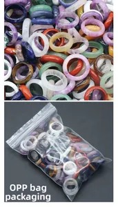 Detailed view of colorful natural crystal agate rings with OPP bag packaging