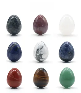Detailed grid view of nine colorful egg-shaped polished natural gemstones and crystals