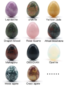 Macro display of diverse 20mm mini egg-shaped polished crystal and agate gemstones