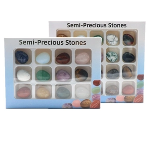 Set of 24 mini gemstone eggs including tiger eye and lapis lazuli in display boxes
