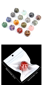 Detail of multi-color natural crystal pumpkins in packaging with size measurements