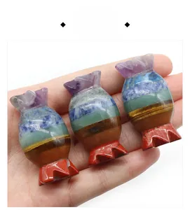 Macro detail of candy-shaped multi-color 7 chakra natural gemstones with smooth texture