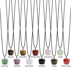 Detail showcasing variety of 20mm apple-shaped natural stone and crystal pendants