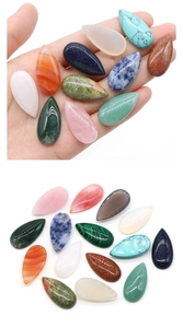 Macro shot of assorted teardrop gemstones for DIY jewelry making in diverse colors