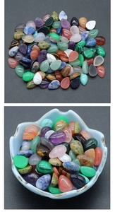 Mix of teardrop-shaped natural crystal gemstones for jewelry making and DIY crafts